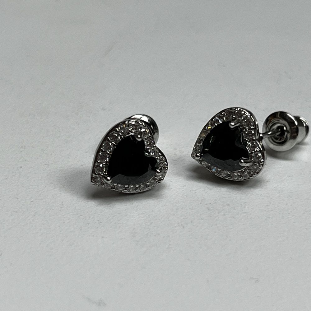 18K gold-plated black zirconia heart stud earrings.